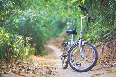 Bicycle parked on field