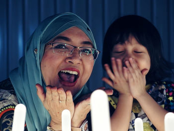 Close-up of mother with son