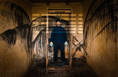 Man in abandoned house