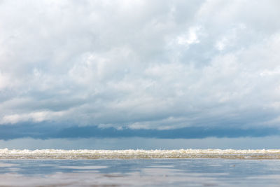 Scenic view of sea and cloudy sky