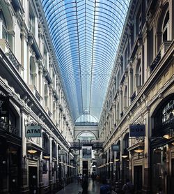 People walking on railroad station in city