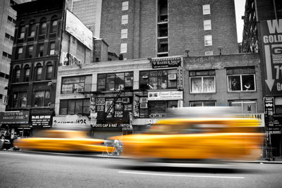 Blurred motion of car on city street