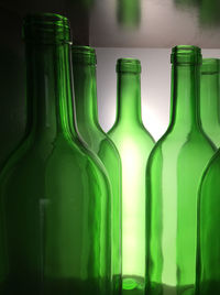 Close-up of empty glass bottles