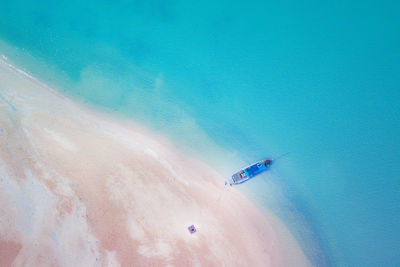 High angle view of surf on beach