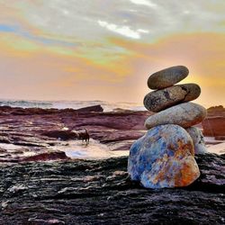 Scenic view of sea at sunset