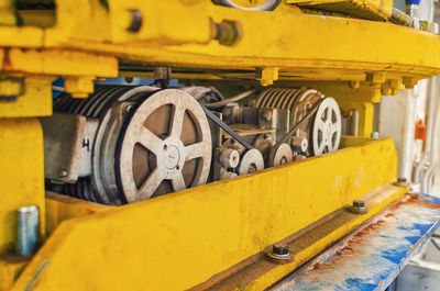 Belt drives, part of industrial equipment, motor transmission.