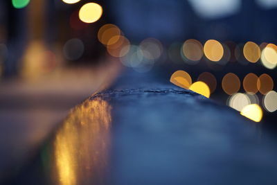 Close-up of illuminated lights at night