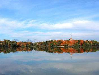 Scenic view of lake against sky during autumn