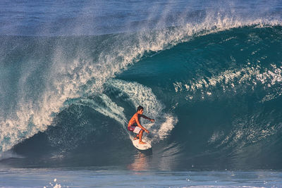 Man surfing in sea