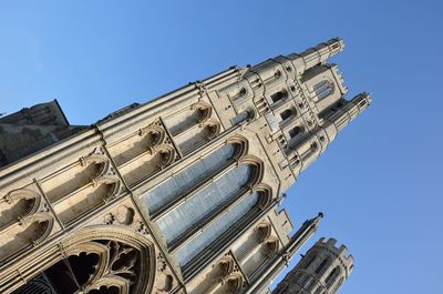 Low angle view of temple against clear blue sky