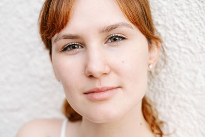 Urban portrait of a young woman in the middle of the city