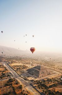 Aerial view of hot air balloon against sky