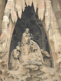 Low angle view of statue of historic building