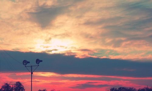 Low angle view of cloudy sky at sunset