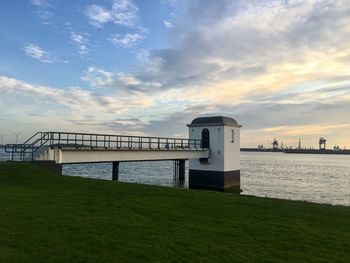 Bridge over river against sky