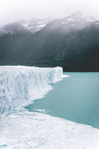 Scenic view of front of perito moreno glacier above water