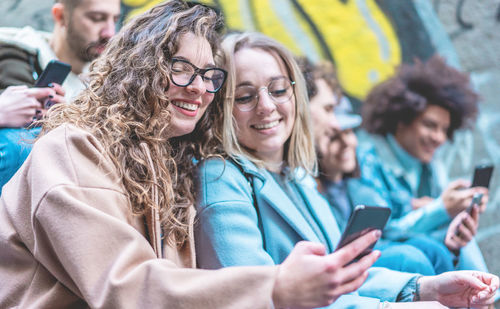 Young woman using mobile phone