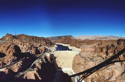 View of dam against blue sky