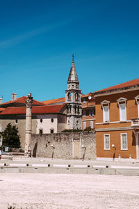 View of historical building against clear blue sky