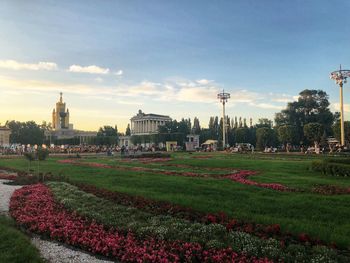 View of formal garden with buildings in background