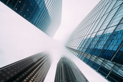 Low angle view of modern buildings against sky