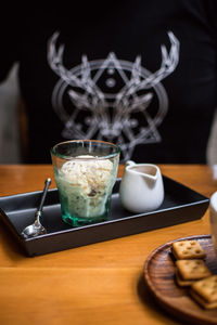 Close-up of coffee cup on table