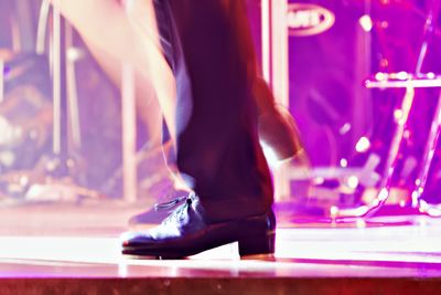 Tap dancing feet on a stage