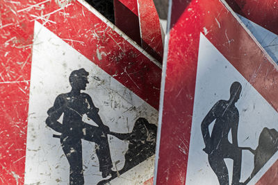 High angle view of arrow sign on road