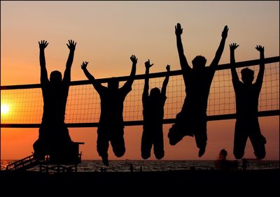 People enjoying at sunset