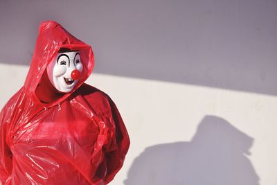 Close-up of red toy on wall