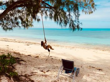 Full length of man on beach against sky