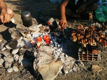 Man preparing food on barbecue grill