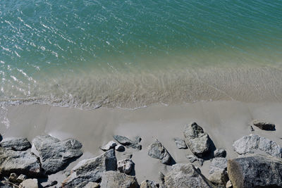 High angle view of rocks on beach