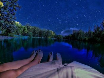 Reflection of trees in calm lake
