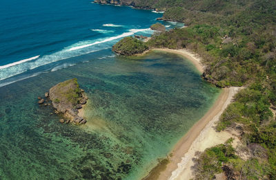 Aerial photo the beauty of kondang merak beach, malang regency