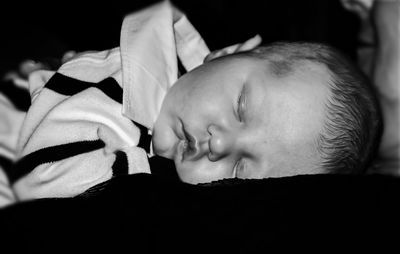 Close-up portrait of cute baby sleeping