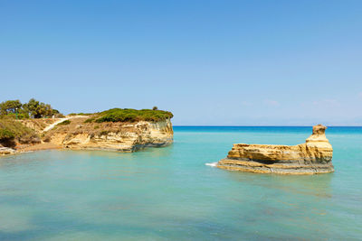 Scenic view of sea against clear sky