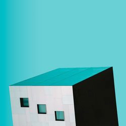 Low angle view of building against blue sky