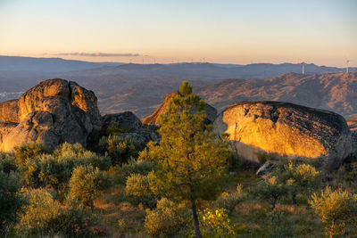 Scenic view of mountains against sky during sunset