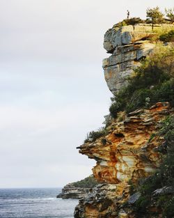 View of rock formations at seaside