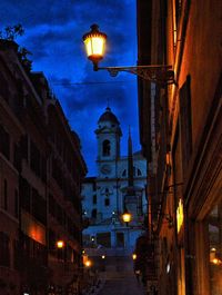 Illuminated street light at night