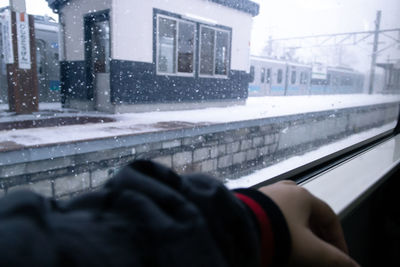 Blurred motion of person seen through car window