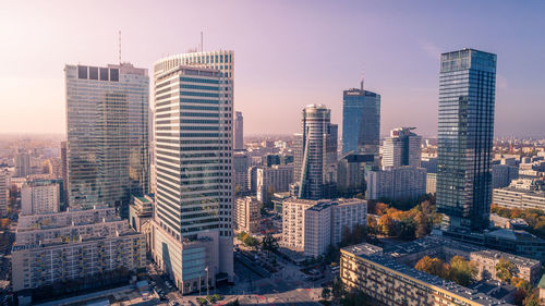 High angle view of cityscape against sky during sunset