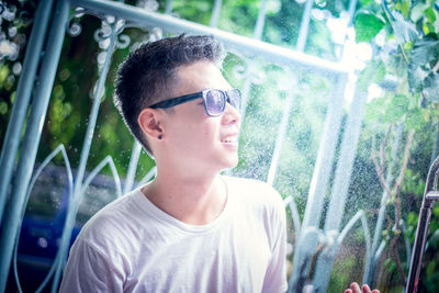 Portrait of young man wearing sunglasses