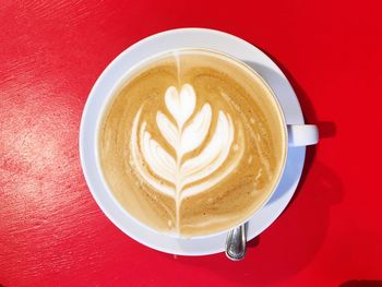 High angle view of cappuccino on table