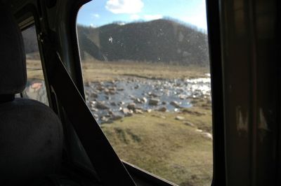 Close-up of cropped car window