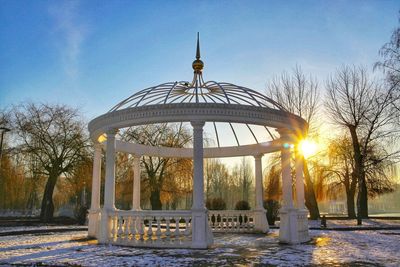 Gazebo in park against sky