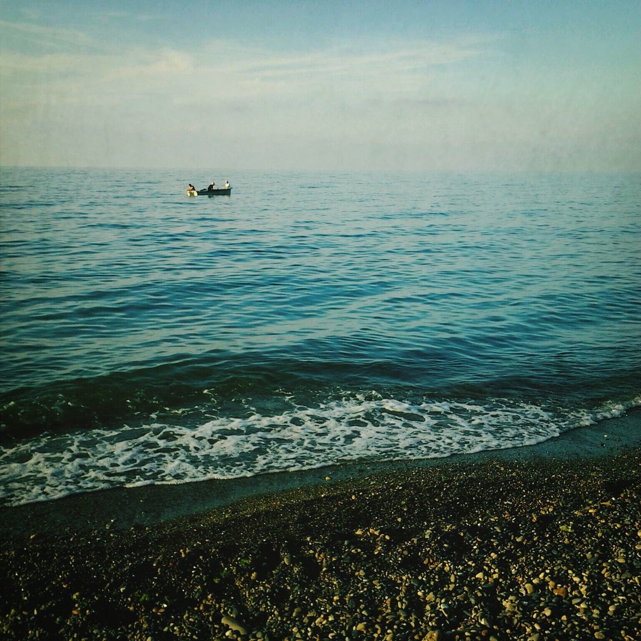 water, sea, sky, horizon over water, tranquil scene, tranquility, scenics, beauty in nature, nautical vessel, nature, rippled, cloud - sky, transportation, boat, idyllic, shore, beach, mode of transport, seascape, calm