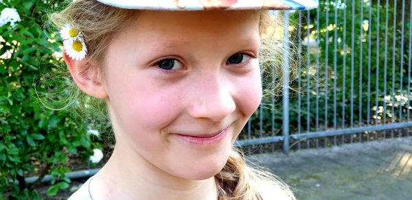 Close-up portrait of smiling girl