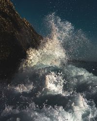 Scenic view of sea against sky at night